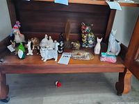 Shelf with full assortment of figurines