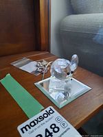 Crystal mouse figurine, brooches bag visible