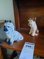 Both SylvaC figurines on shelf