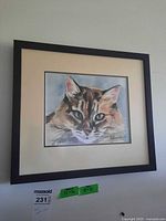 Full view of framed cat watercolor with mat and frame