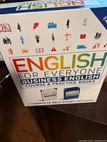 Photo of the Business English Self Study Program box showing the front cover with the title and colorful icons.