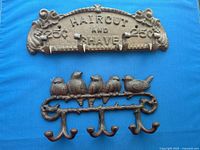 Both cast iron wall hooks front view