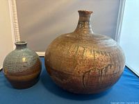 Front view of both vases showing shape and glaze