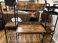 Front view of entire workstation desk showing desktop, hutch, and side shelves