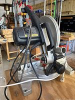 Left side view of Craftsman compound miter saw on workbench