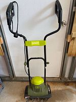 Full view of Sun Joe tiller with handle and power cord