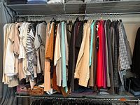 Full view of garments on hanging rack