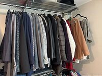 Full rack of assorted jackets, coats and blazers