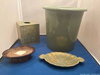 All four ceramic bathroom pieces displayed together