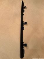 Full view of one running board showing brackets