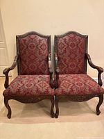 Front view of both armchairs showing full design