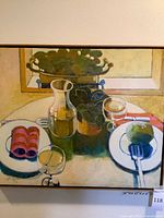 Full view of framed still life painting showing signature and context