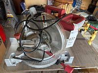 Front view showing blade, base, guard, cord