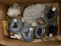 Overview of all mineral specimens inside box