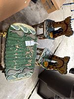 Top view of table with two chairs, showing overall design and wear