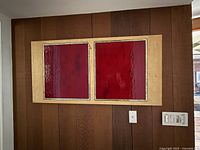 Full view of artwork mounted on wall