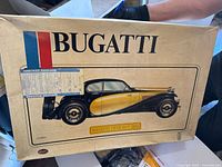 Front of Pocher Bugatti model kit box showing artwork and scale information