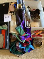 Box with multiple scarves, costume jewelry in plastic bin