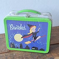 Front of sealed Bewitched lunch box with Samantha on broom graphic