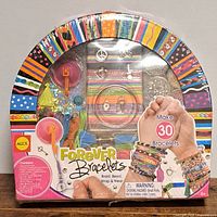 Front of sealed Alex Forever Bracelets kit showing contents and make 30 bracelets text