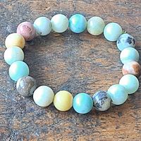 Full view of bracelet laid flat showing all multicolor beads