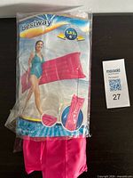 Front of packaged Bestway pink pool float with size 1.83 m indicated