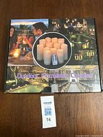 Retail box lid showing product images and title Outdoor Flameless Candles