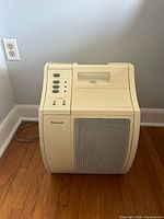 Front view of Honeywell air purifier on floor
