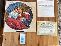 Front view of plate with COA and info sheet