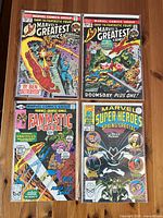 All four bagged comic books displayed