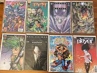 All eight bagged & boarded comics in two rows