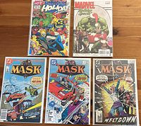 Group shot of all five bagged comics