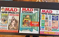 Front covers of MAD Super Special issues 14, 15, 16