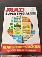 Front cover showing title, price, issue number, bonus notice