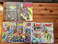 Seven bagged and boarded Valiant/Dark Horse Magnus Robot Fighter comics displayed on table