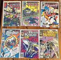 Group shot of six bagged Marvel comics