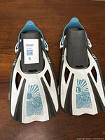 Top view of both fins showing color scheme and brand graphic