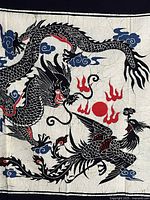 Close-up of dragon and phoenix motif left side