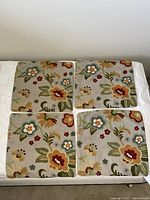 four colourful wool-on-linen floral cushion covers
