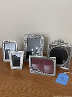 Group shot of five Seagull Canada pewter frames