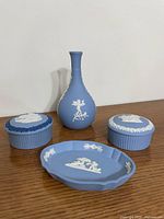 Group shot of bud vase, tray and two lidded boxes