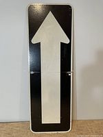 Front view of metal one-way sign