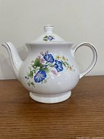 Left side view of Sadler floral teapot showing gold trimmed spout and floral motif