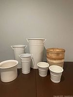 all eight containers group shot