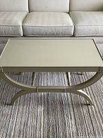 Full view of coffee table in front of sofa