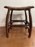 Front view showing full stool and woven seat