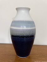 Full frontal view of vase displaying color gradient and shape
