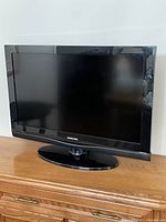 Front view of Samsung LCD TV on stand