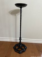Full view of cast iron pedestal plant stand