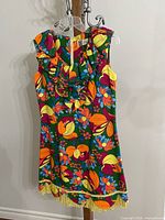 Front view of floral sleeveless mini dress on hanger